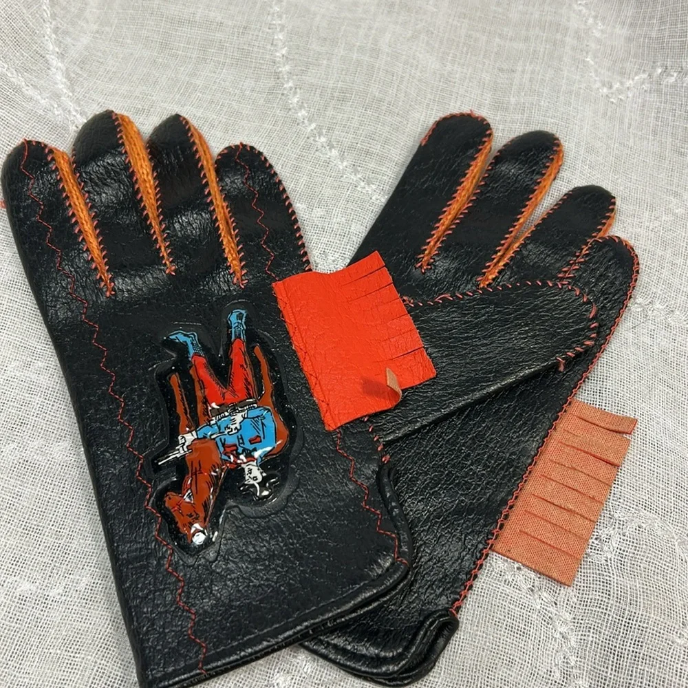 Vintage leather cowboy riding gloves with fringe